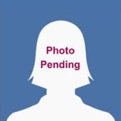 A silhouette of a person with shoulder-length hair is set against a blue background. The text "Photo Pending" is written in red over the silhouette's face, indicating that the actual photo is not yet available.